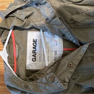 Small green garage jacket